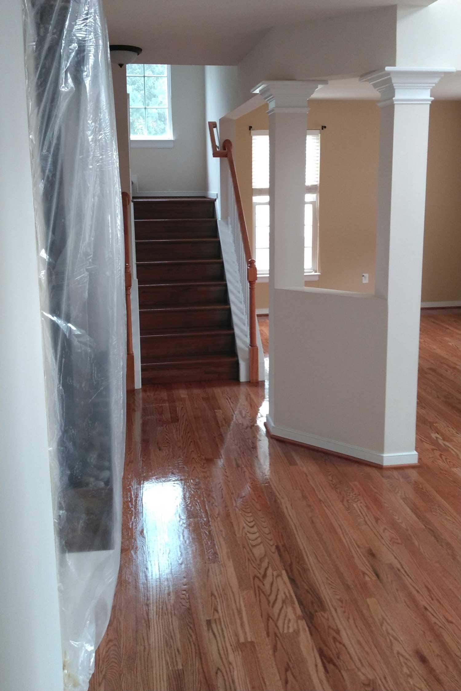 Oak hardwood floor and staircase refinished by Buff & Coat in Richmond, VA